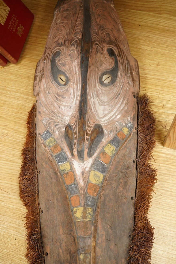 Oceanic tribal art interest; a Papua New Guinea carved and painted mask, 70cm